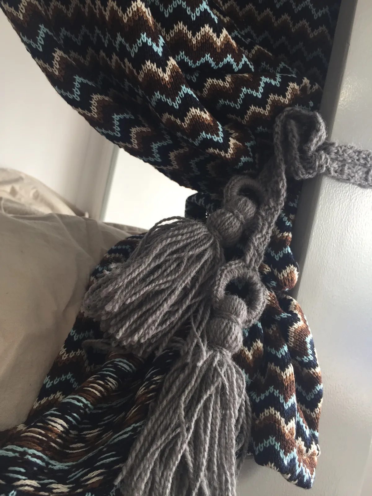 Patterned fabric and a decorative curtain tie