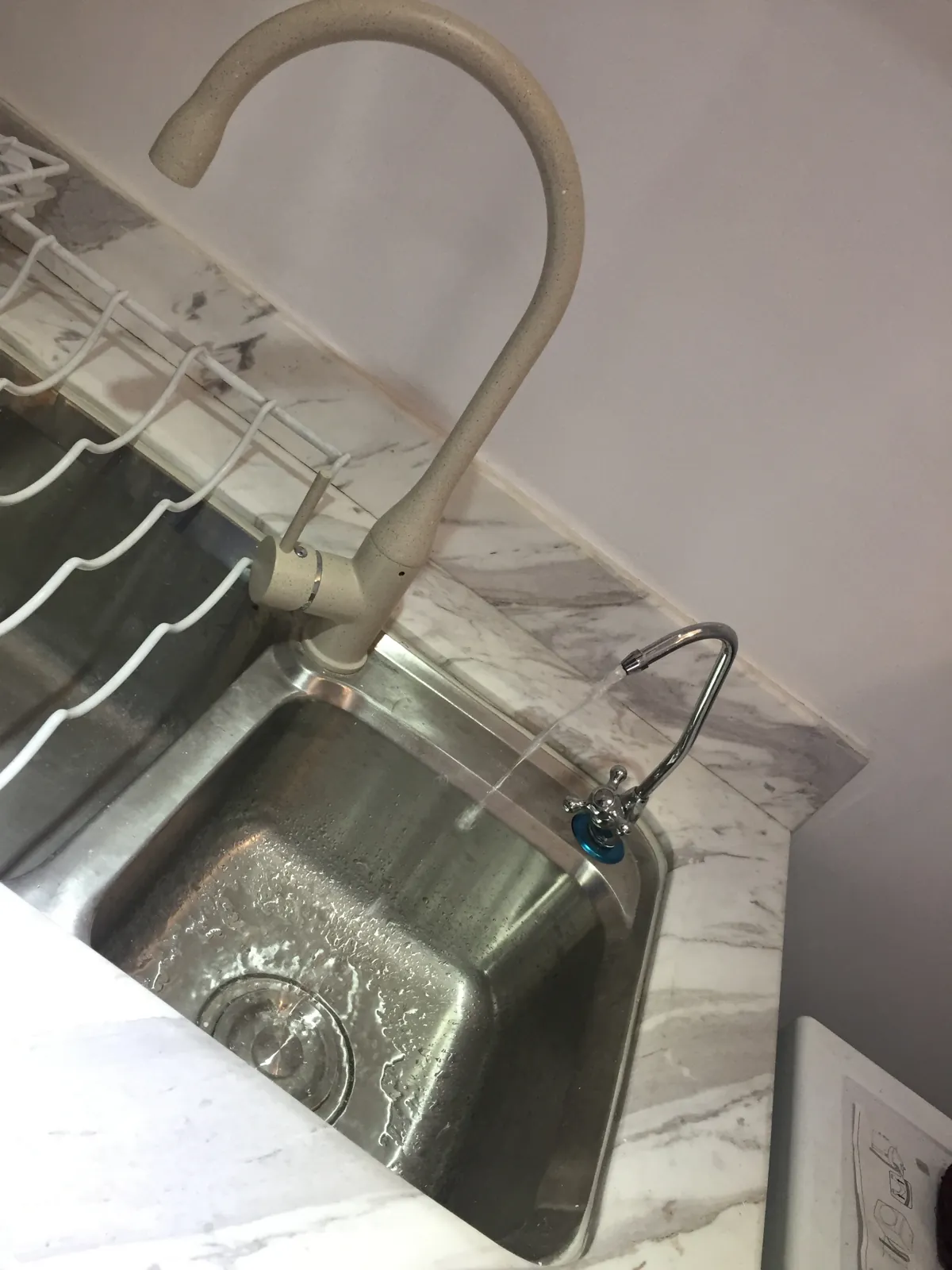 The kitchen sink and work surface