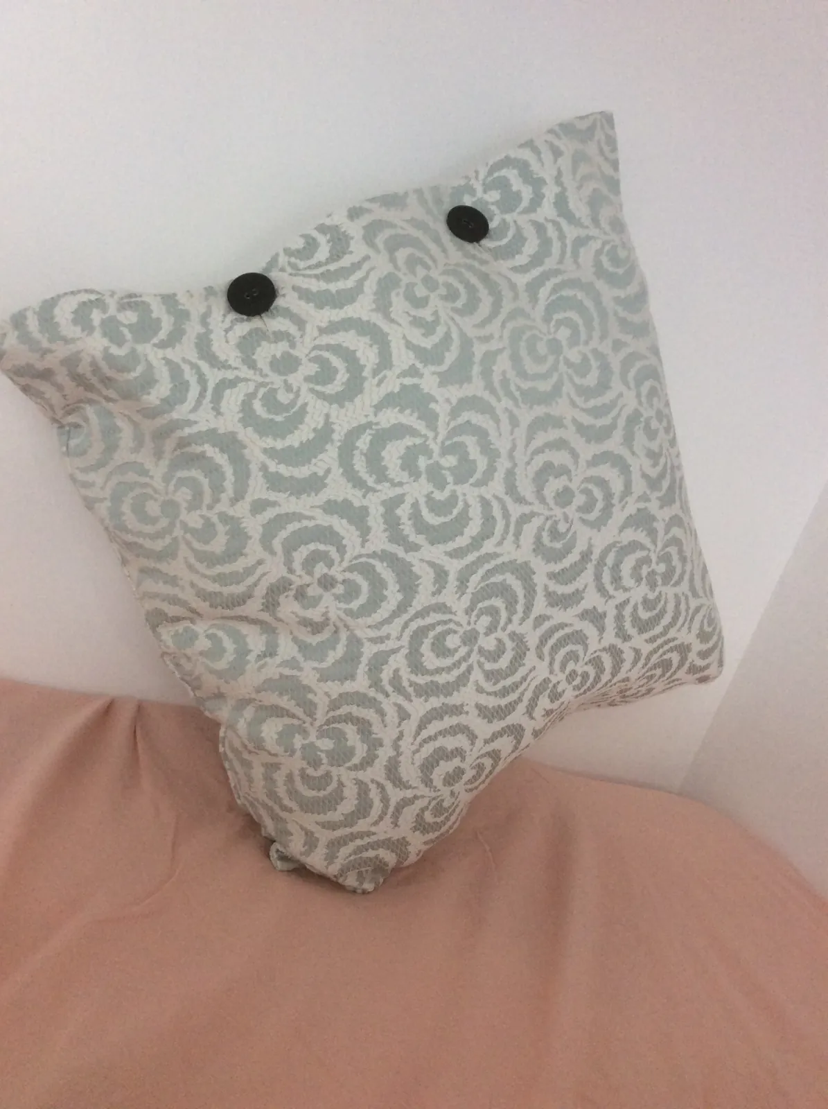 A textured decorative pillow